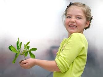 Green Kids_girl with plant