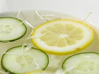 Lemon and cucumber slices in water