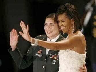 Michelle Obama with woman in military