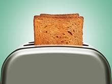 Toaster with pieces of bread