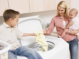 Teaching Responsibility, boy learning to do laundry