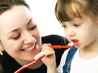 Teaching Responsibility, self-care skills, girl brushing teeth