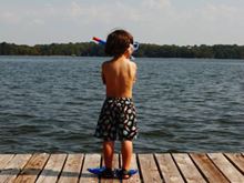Boy on Dock, Arms Crossed Looking