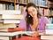 Woman reading in library