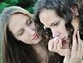 Young woman comforts her friend