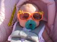 Cute baby wearing funky sunglasses