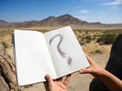 Notebook with question mark