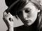 girl tipping hat