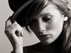 girl tipping hat