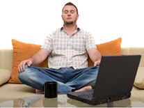 Man meditating on a sofa.