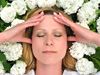 Woman relaxing among flowers