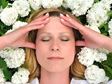 Woman relaxing among flowers