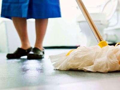 Woman mopping floor