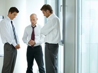 Three men before a meeting