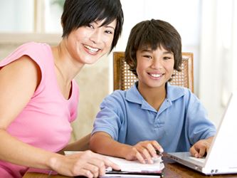 Teaching respect - mom and son on computer