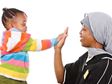 Mother and daught high-five