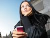Young woman listening to iPod