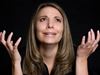 A woman desperate with her hands up