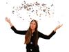 Woman with scattered confetti in the air