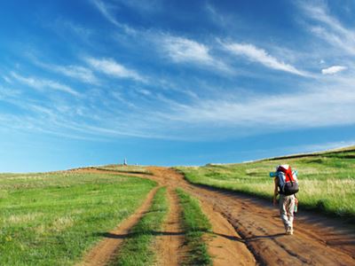 Man hiking on a dirt road