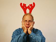 Sad man with reindeer horns