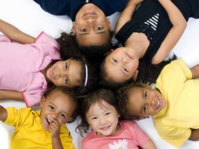 kids laying in circle
