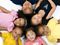 kids laying in circle