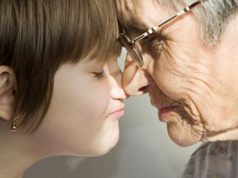 Grandmother and granddaughter looking at each other