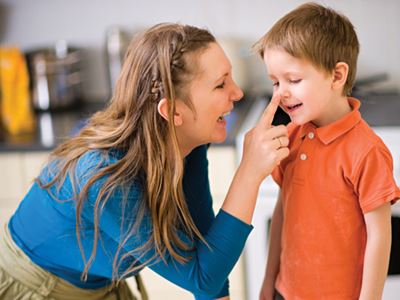 Mom and son playing