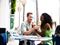 Man and woman sharing ice cream cones on a date