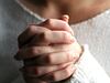 Woman praying hands