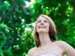 Happy woman in the woods