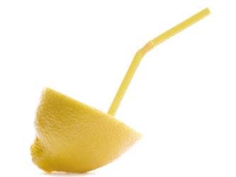 Lemon half with straw
