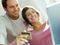 Couple using credit card to buy online