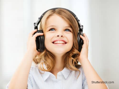 Little Girl with Headphones