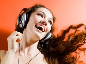Happy Woman Listening to Music