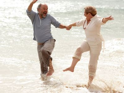 Couple frolicking in the ocean