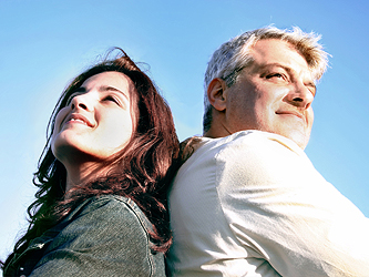 Man and Woman Back to Back