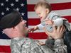 soldier dad holding baby