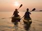 Man and woman kayaking on a date