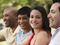 Four people smiling