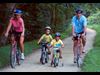 family riding bikes