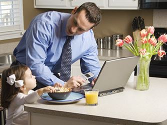 Teaching Responsibility, dad giving his child breakfast