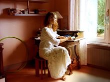 Young woman writing a letter