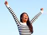 woman reaching sky