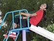 Laughing child on slide