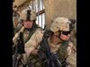 U.S. Army soldiers along wall