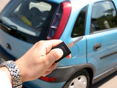 Man with car key