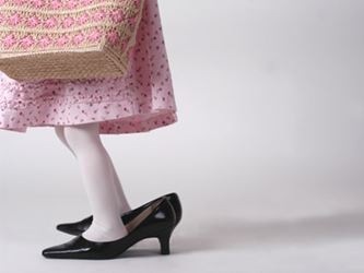 Little girl playing dress-up