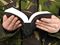 soldier holding bible